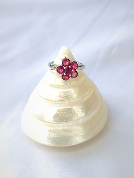 Rotate red flower ring