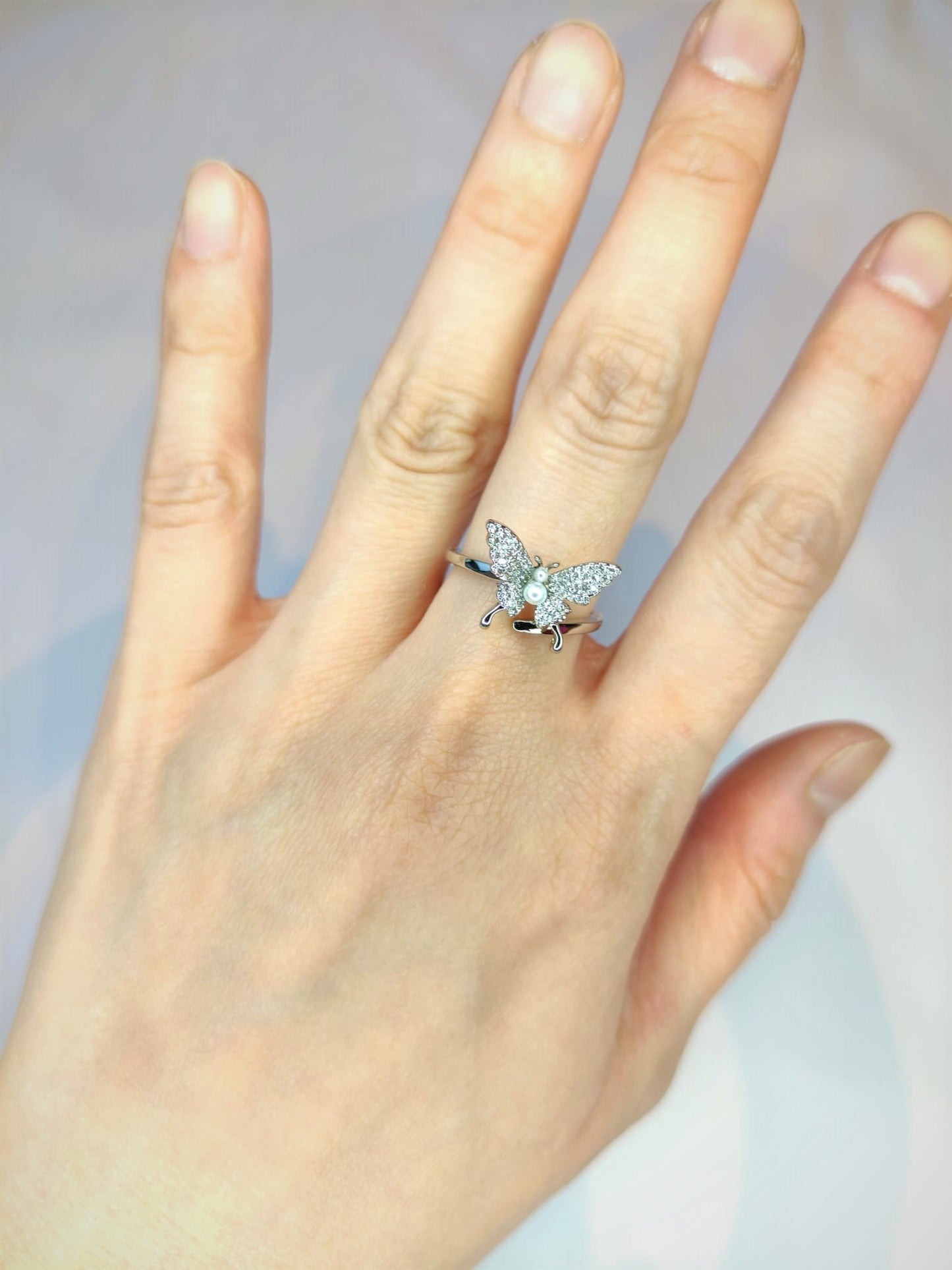 White butterfly ring